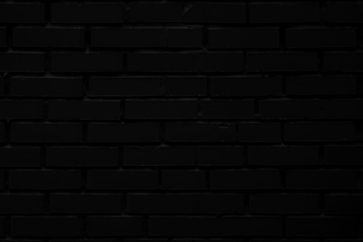 Black brick wall.